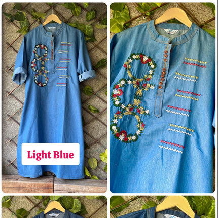 Collage of a blue shirt with floral embroidery in two colors on a wooden surface.